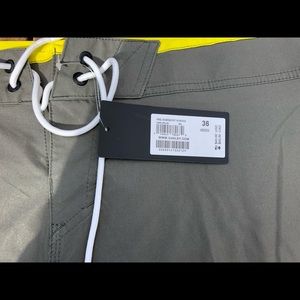 Oakley Swim - Men’s Oakley Bathing Suit grey/yellow size 36 Oakley Swim - Men’s Oakley Bathing Suit grey/yellow size 36